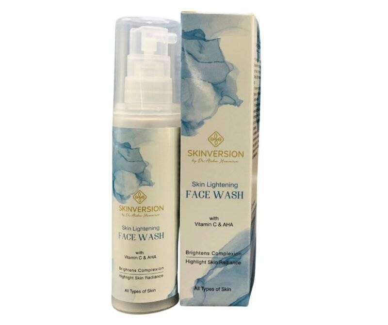 Tube of skin whitening face wash with a clean, minimalist design, featuring natural ingredients like vitamin C and aloe vera, placed on a bathroom counter with fresh water droplets